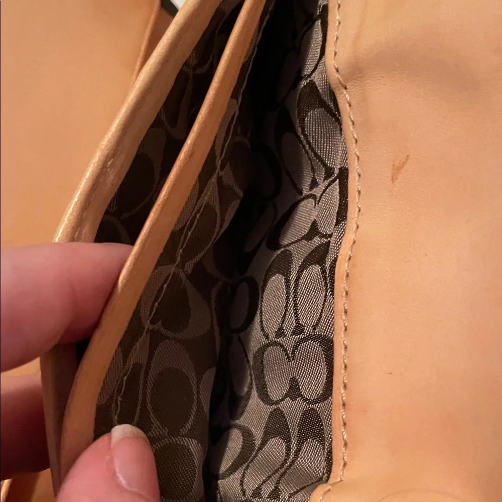 Coach triple wallet. EUC few call outs on inside.